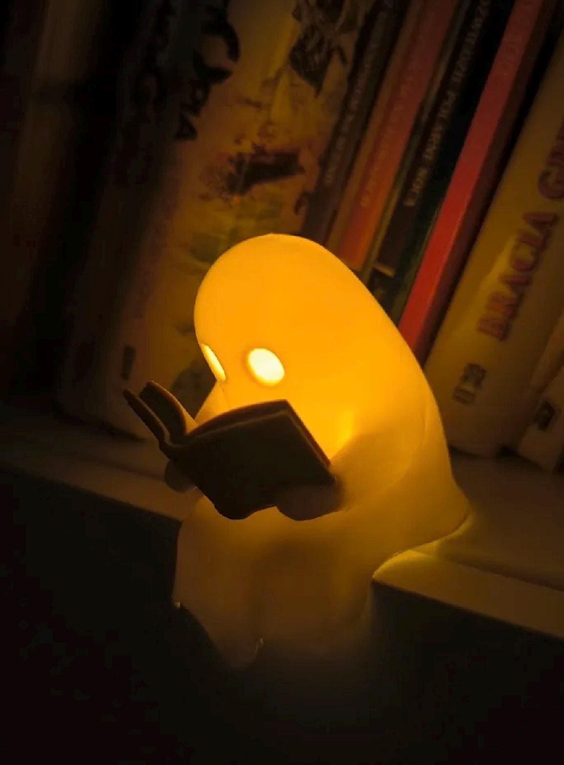 Ghost reader book shelf sitter. Light up, wonderful ornament