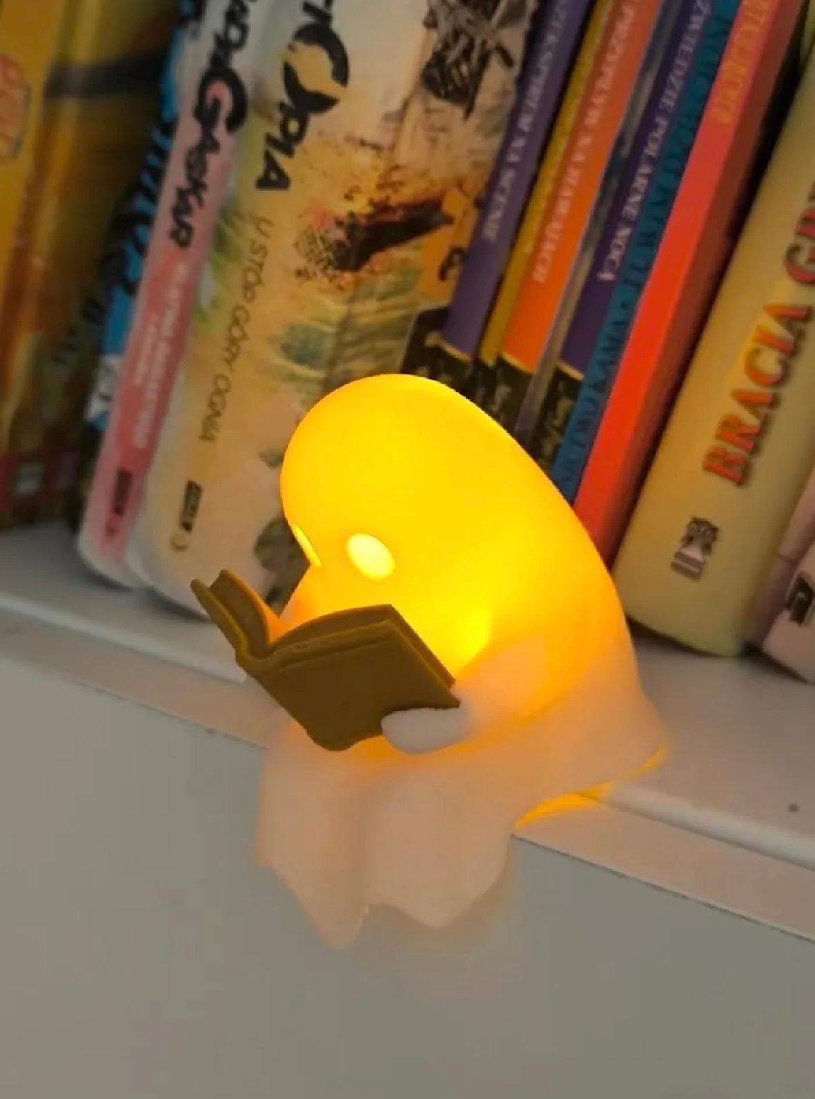 Ghost reader book shelf sitter. Light up, wonderful ornament